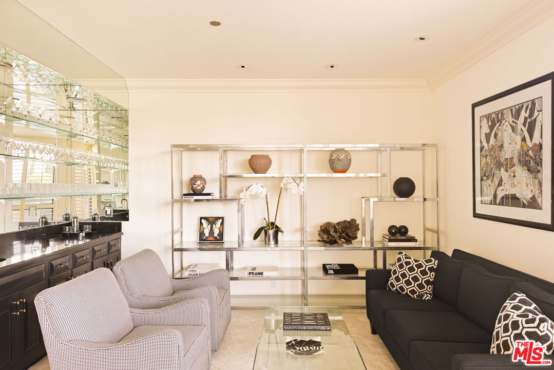 300 North Swall Drive, Unit 353 Beverly Hills, CA 90211 - Photo 10 of 31 a living room with furniture and a large window