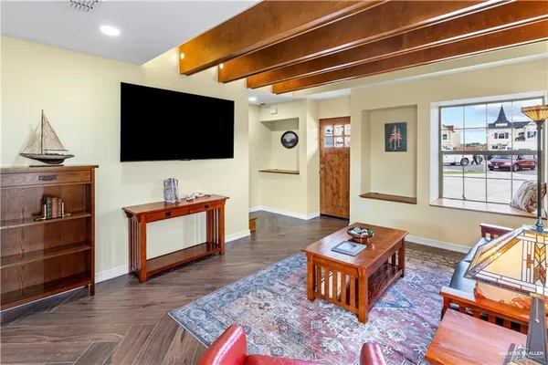 a bedroom with a bed and a table