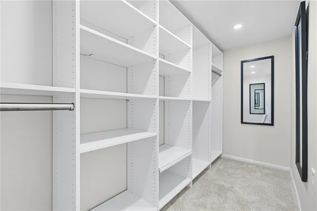 a view of an empty walk in closet