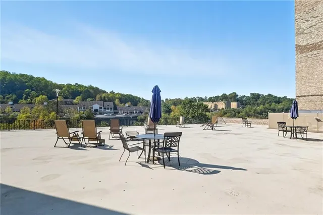 a view of a terrace with chairs
