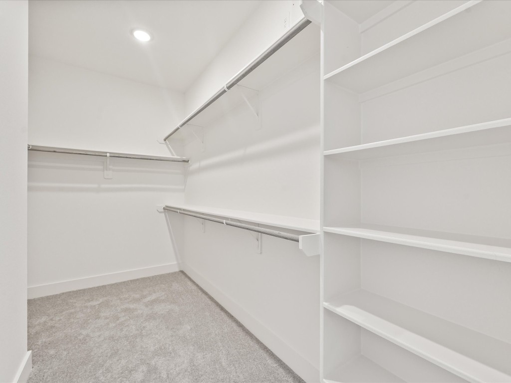 243 Rebecca Street, Unit F Houston, TX 77022 - Photo 17 of 26 a view of an empty walk in closet
