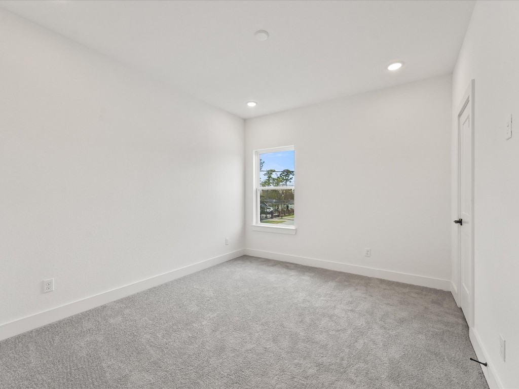 243 Rebecca Street, Unit F Houston, TX 77022 - Photo 19 of 26 a view of an empty room