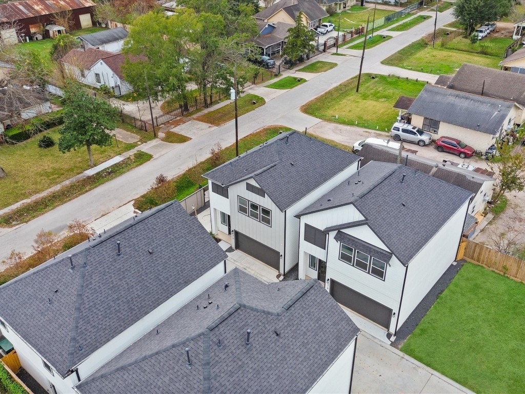 243 Rebecca Street, Unit F Houston, TX 77022 - Photo 25 of 26 an aerial view of a house with a yard