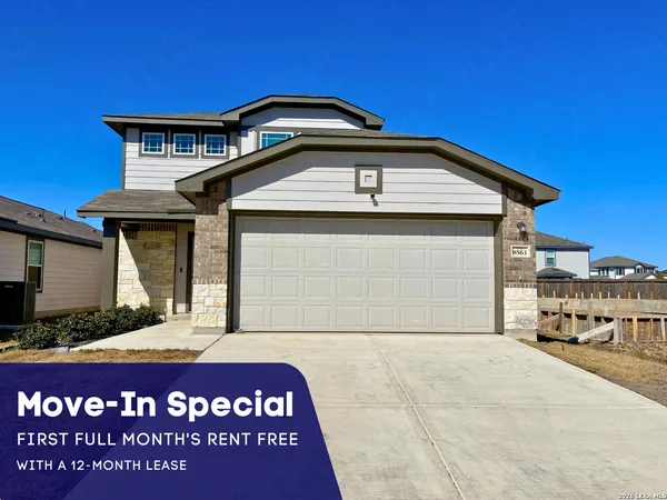 a front view of a house with yard