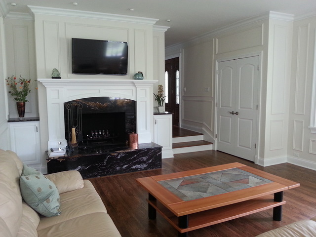 1718 Appleby Road Inverness, IL 60067 - Photo 2 of 24 a living room with furniture and a fireplace