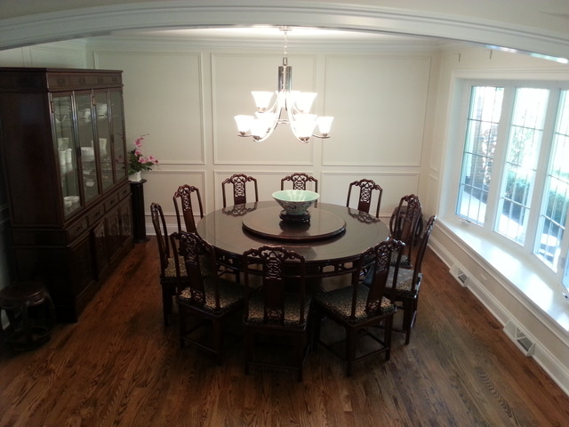 1718 Appleby Road Inverness, IL 60067 - Photo 11 of 24 a dining room with furniture a chandelier and wooden floor