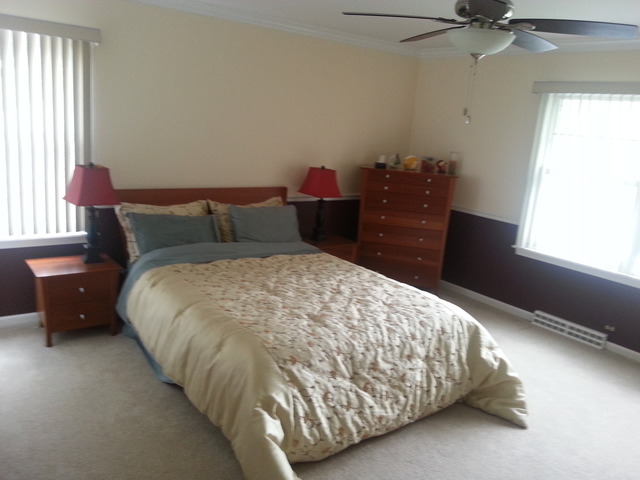 1718 Appleby Road Inverness, IL 60067 - Photo 14 of 24 a bedroom with a bed and window