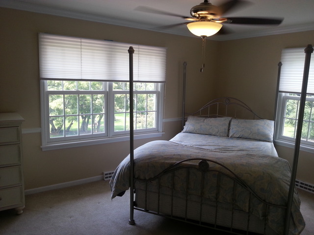 1718 Appleby Road Inverness, IL 60067 - Photo 15 of 24 a bedroom with a bed and a window