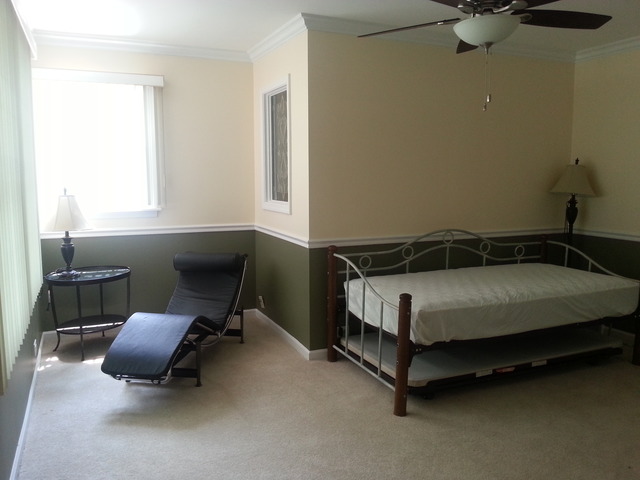 1718 Appleby Road Inverness, IL 60067 - Photo 16 of 24 a bedroom with a bed and a window