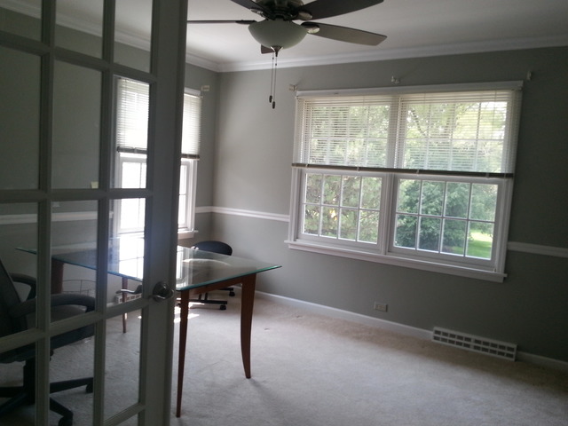 1718 Appleby Road Inverness, IL 60067 - Photo 17 of 24 a view of a workspace with furniture and a window