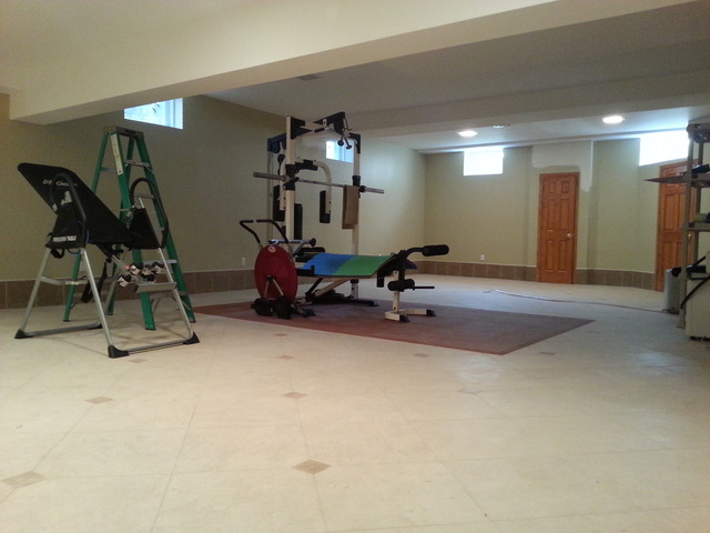 1718 Appleby Road Inverness, IL 60067 - Photo 20 of 24 a room with gym equipment and view of living room