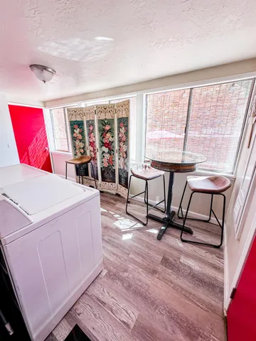 a view of a livingroom with furniture window and outside view