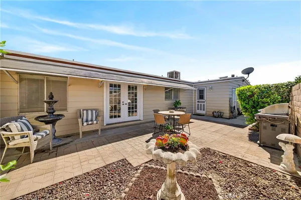 a building outdoor space with patio furniture