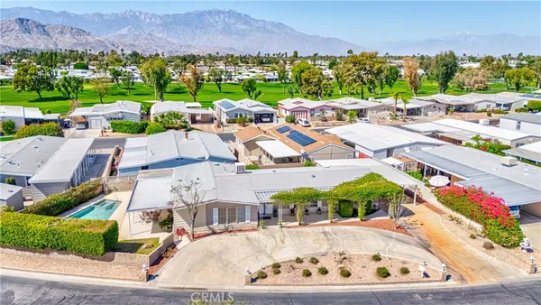 a view of a city with a ocean view