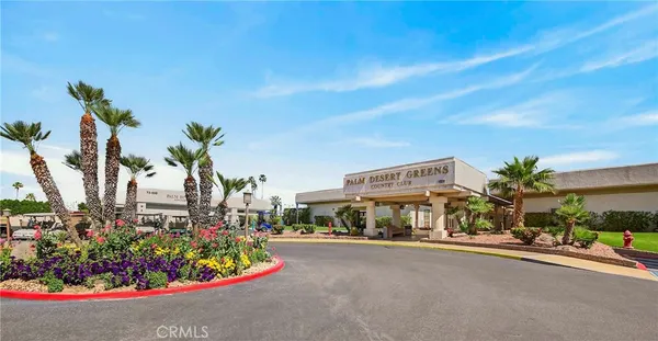 a view of a golf course with a lake