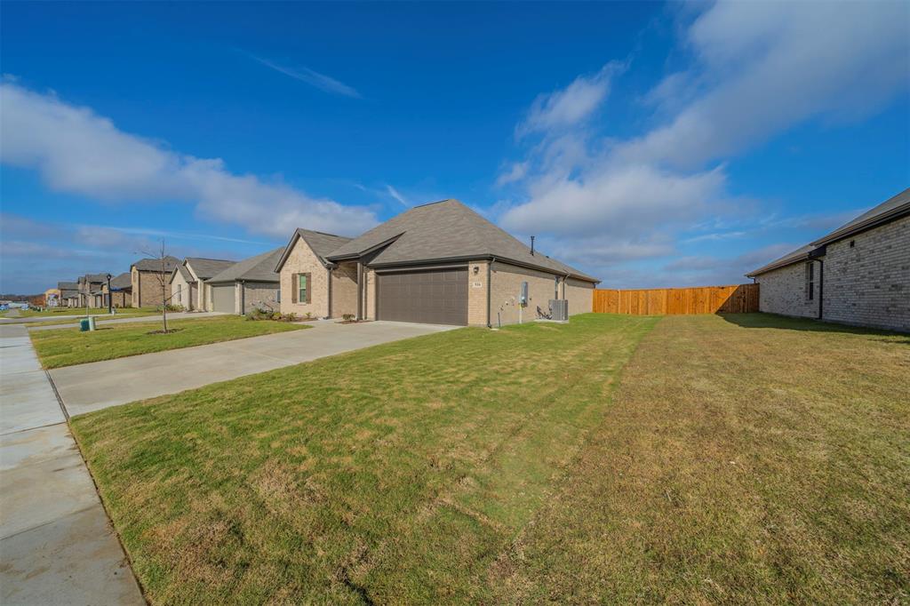516 Ridgewood Drive Van Alstyne, TX 75495 - Photo 21 of 25 a house view with a outdoor space