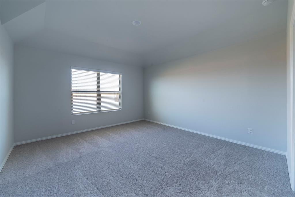 516 Ridgewood Drive Van Alstyne, TX 75495 - Photo 10 of 25 an empty room with windows