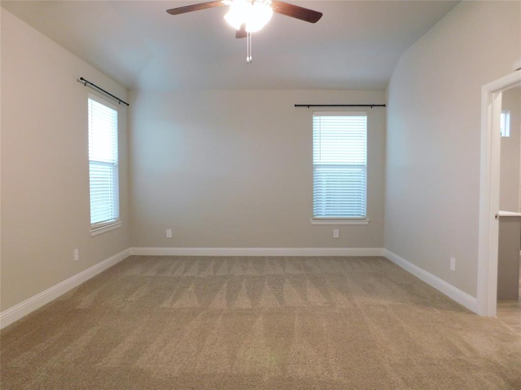 1708 Buzzard Road Denton, TX 76205 - Photo 11 of 28 a view of an empty room with a window