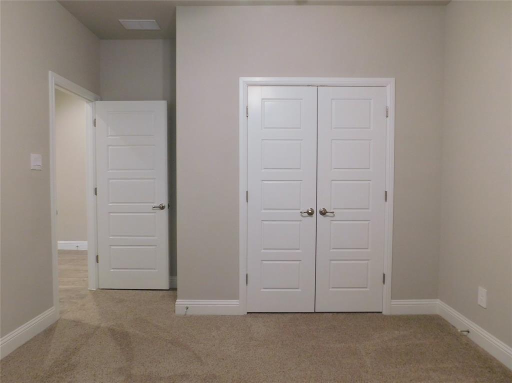 1708 Buzzard Road Denton, TX 76205 - Photo 17 of 28 an empty room with closet area