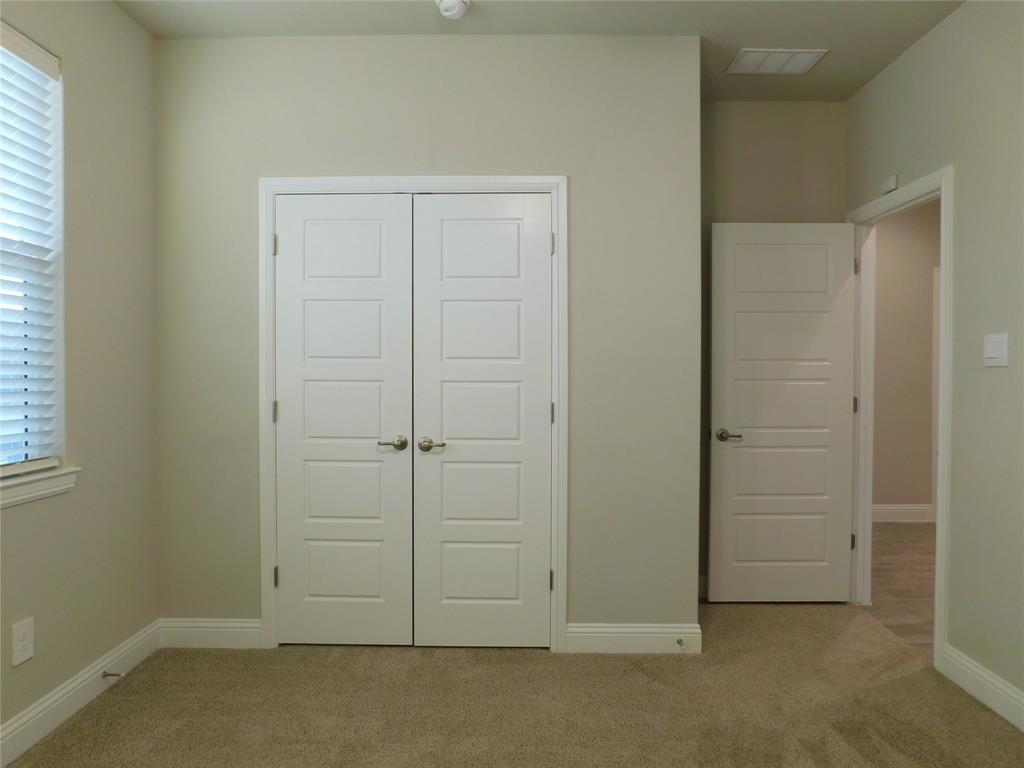 1708 Buzzard Road Denton, TX 76205 - Photo 19 of 28 an empty room with closet area