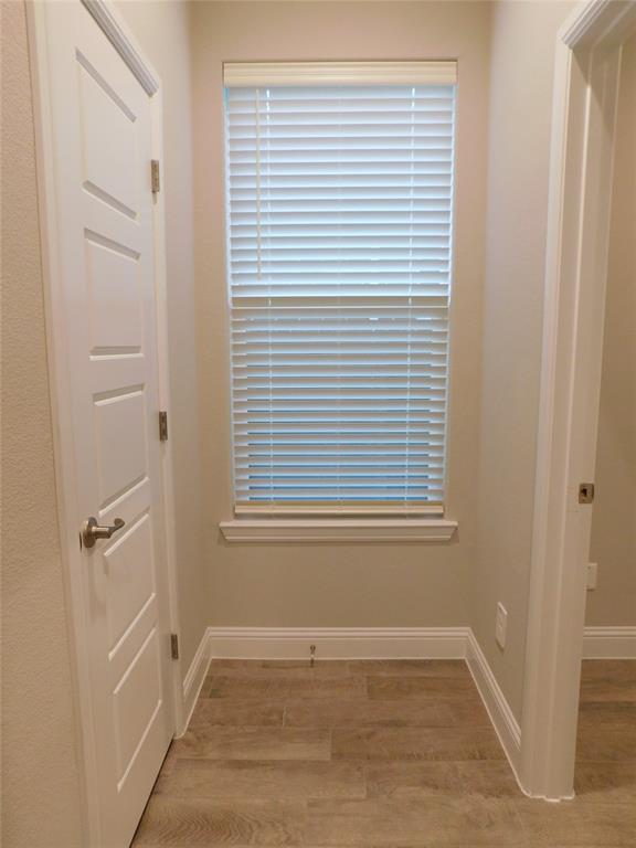 1708 Buzzard Road Denton, TX 76205 - Photo 23 of 28 a view of an empty room with a window