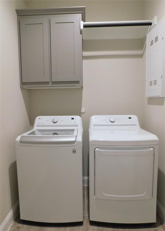 1708 Buzzard Road Denton, TX 76205 - Photo 24 of 28 a utility room with dryer and washer