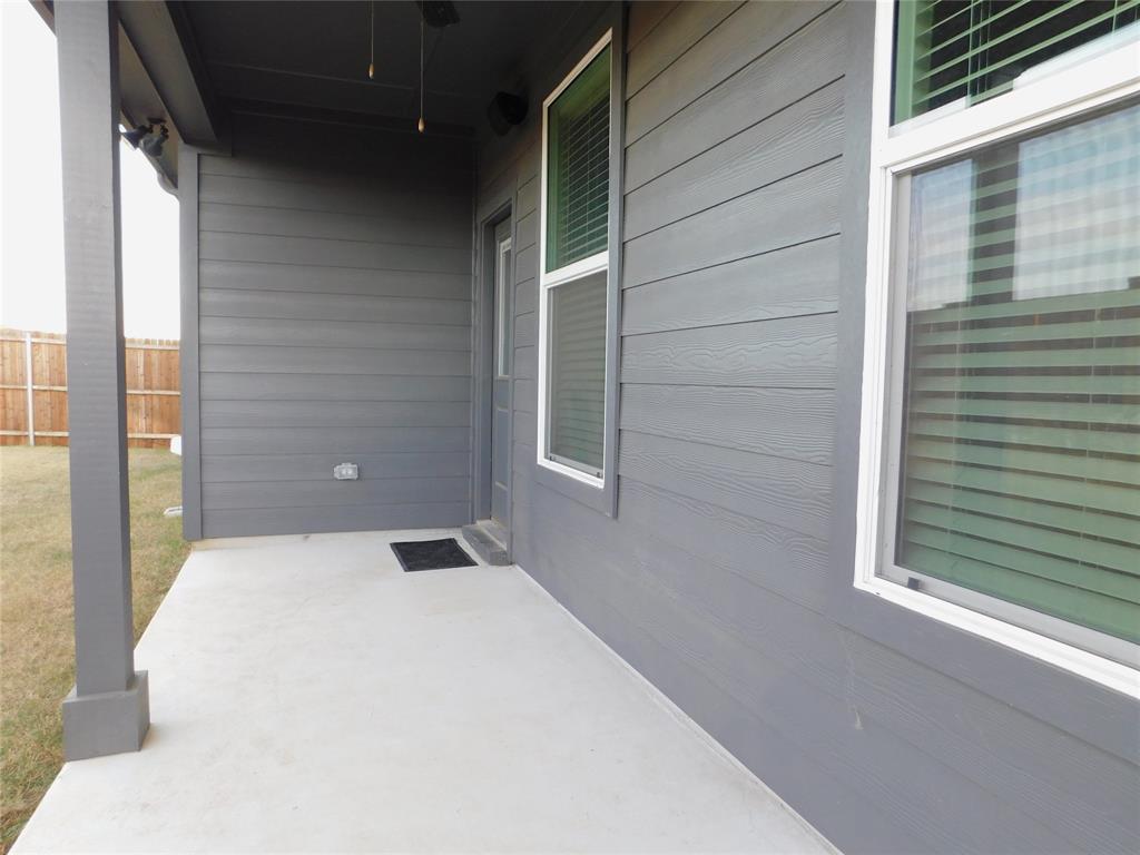1708 Buzzard Road Denton, TX 76205 - Photo 26 of 28 a balcony with a bed
