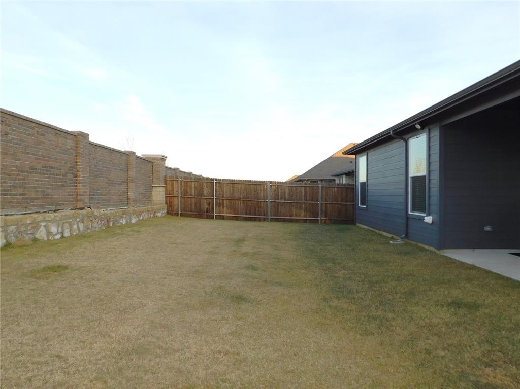 1708 Buzzard Road Denton, TX 76205 - Photo 27 of 28 a view of a backyard