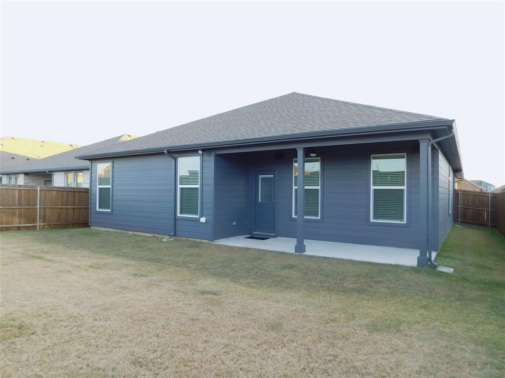 1708 Buzzard Road Denton, TX 76205 - Photo 28 of 28 a front view of a house with a yard