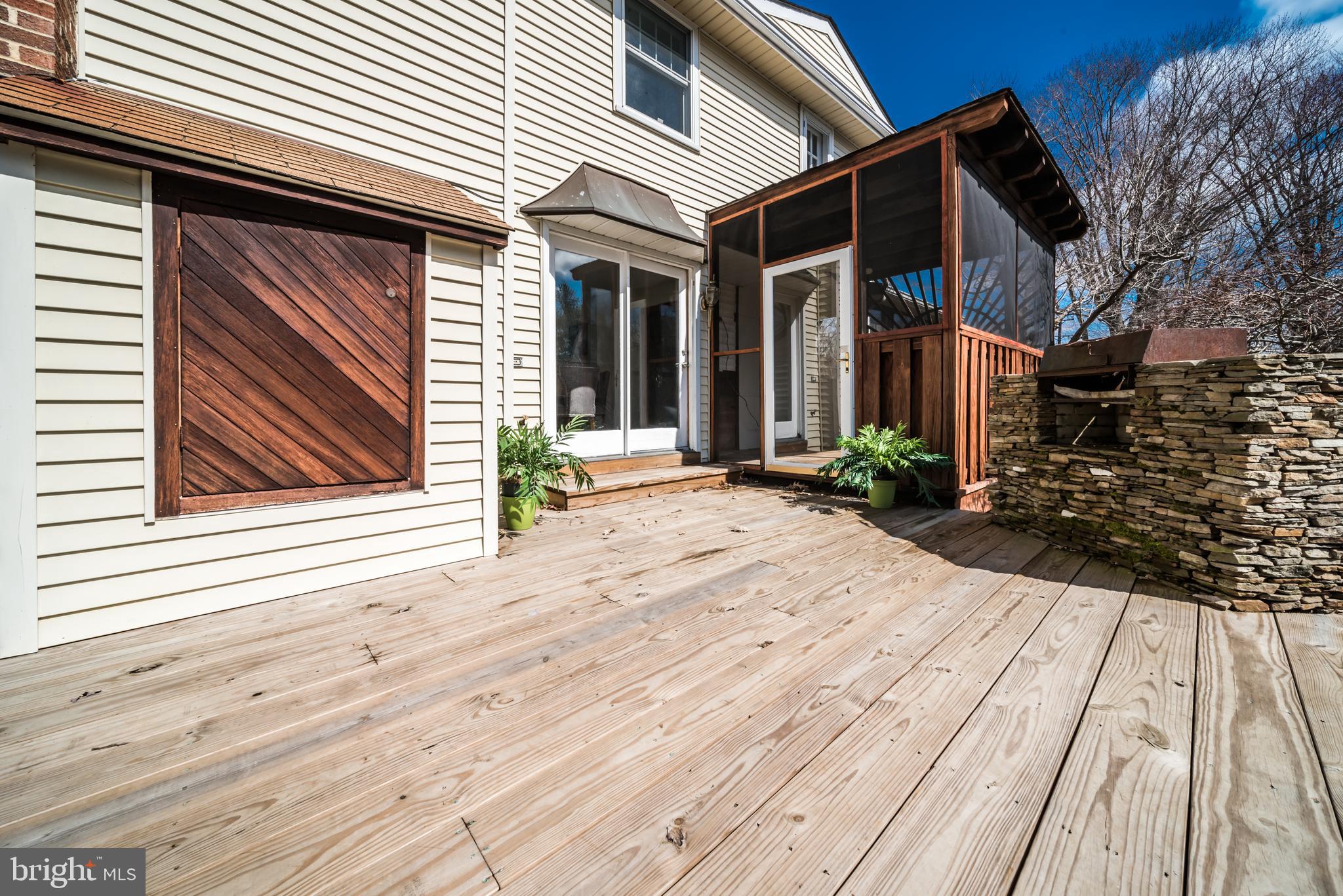 6801 Old Solomons Island Road Friendship, MD 20758 - Photo 5 of 74 Grill deck and second screened porch