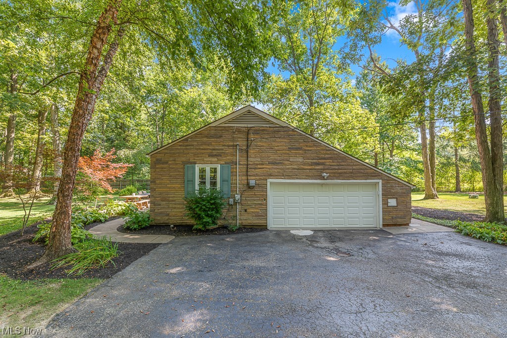 32261 Cedar Road Cleveland, OH 44124 - Photo 4 of 35 View of property exterior featuring garage