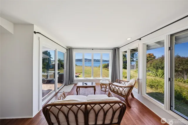 a bedroom with furniture and windows