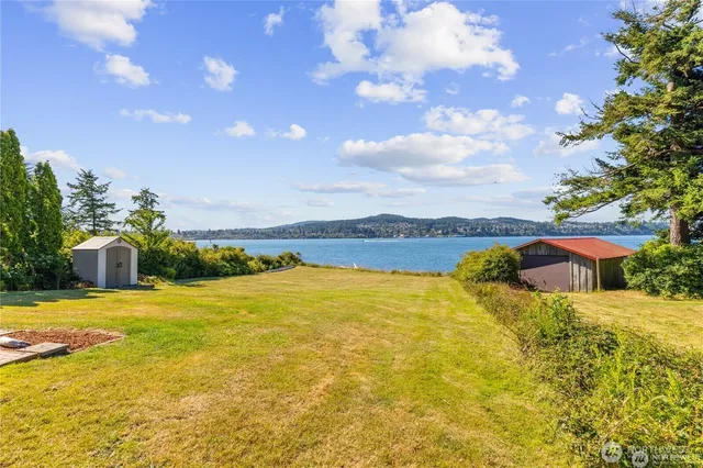 a view of a swimming pool with an ocean view