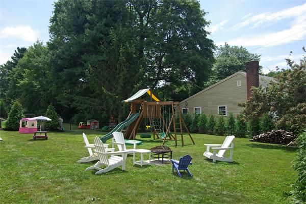 7 Westvale Road Milton, MA 02186 - Photo 13 of 14 a view of playground with a slide and swing