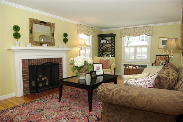 7 Westvale Road Milton, MA 02186 - Photo 2 of 14 a living room with furniture and a fireplace