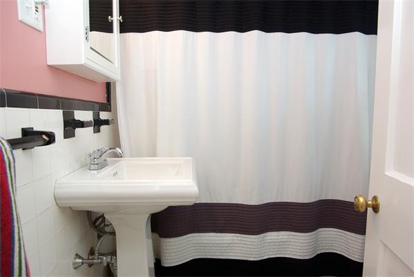 7 Westvale Road Milton, MA 02186 - Photo 9 of 14 a bathroom with a sink and a mirror