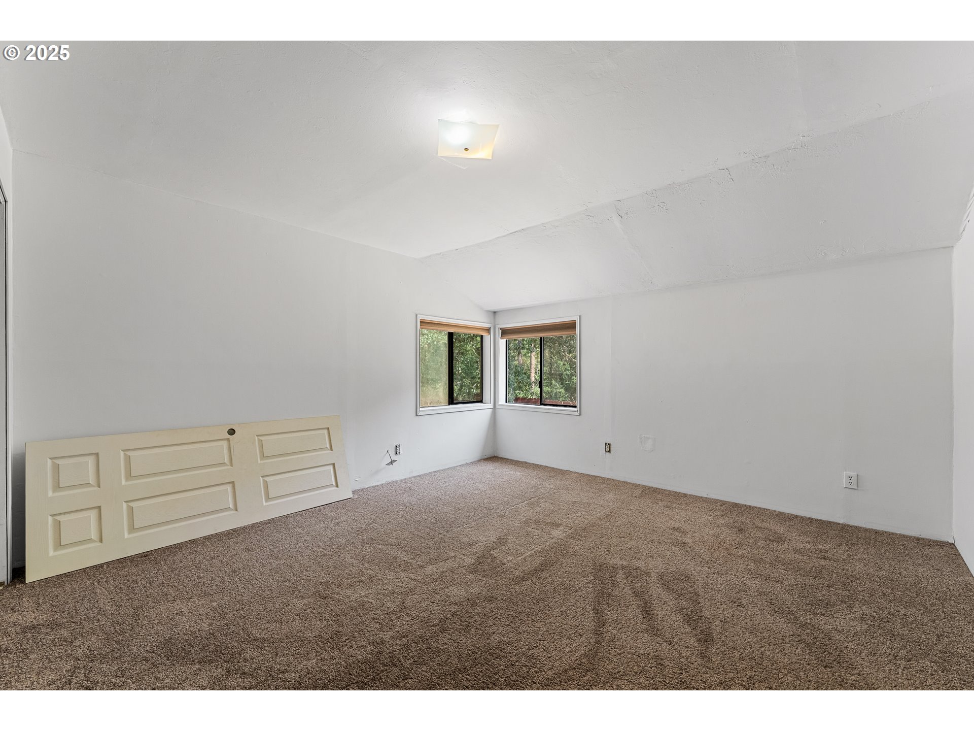 3461 West Evans Creek Road Rogue River, OR 97537 - Photo 15 of 40 a view of an empty room and window