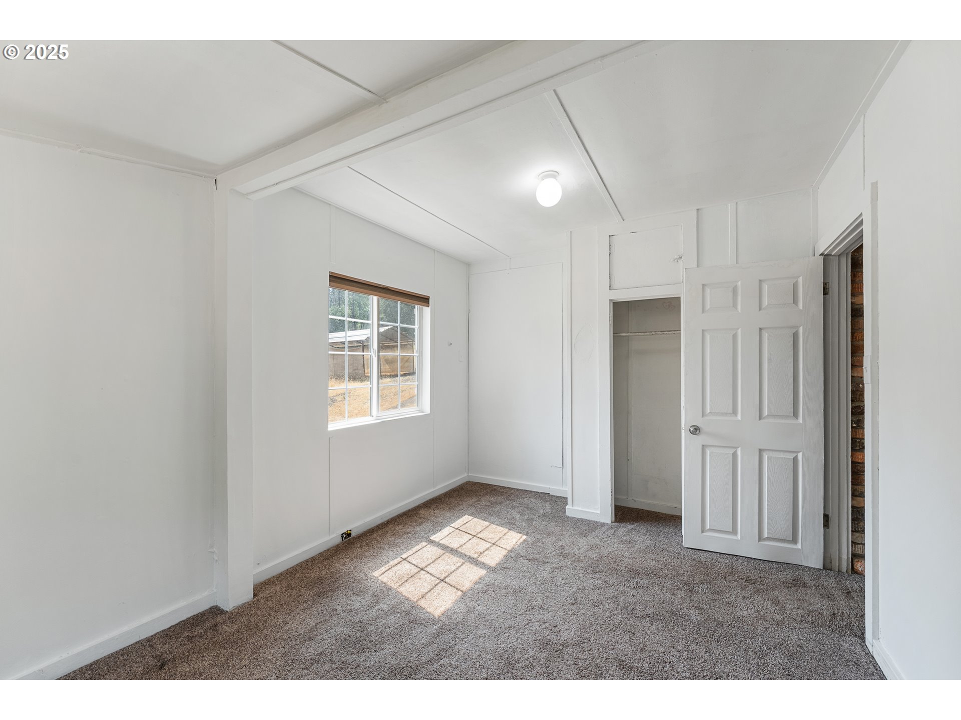 3461 West Evans Creek Road Rogue River, OR 97537 - Photo 18 of 40 a view interior of a house and an empty room