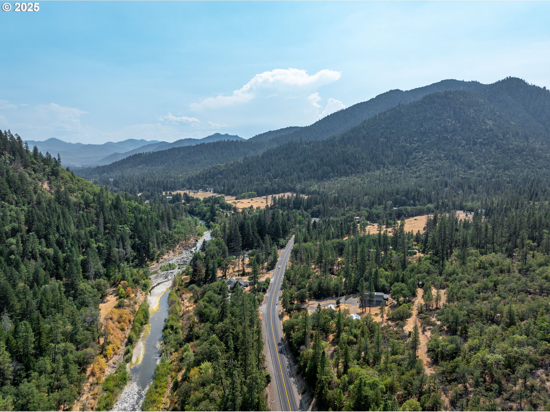 3461 West Evans Creek Road Rogue River, OR 97537 - Photo 38 of 40 a view of a city with a mountain