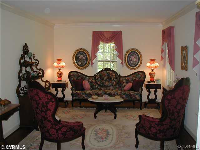 500 Fords Road Manakin-Sabot, VA 23103 - Photo 11 of 24 a view of a dining room with furniture and wooden floor