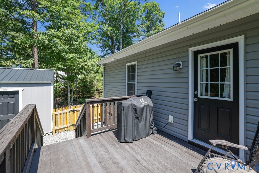 222 Oak Ridge Court Aylett, VA 23009 - Photo 27 of 35 Outdoor wood-finish deck with railing and steps