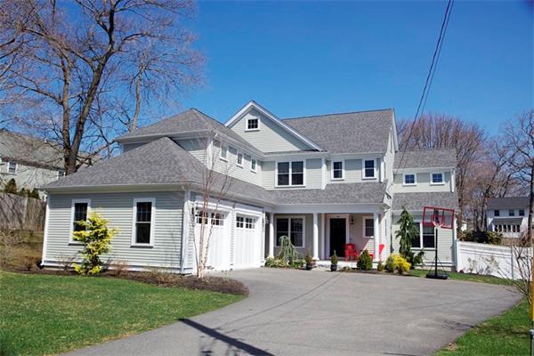 39 Thurston Lane Needham, MA 02492 - Photo 2 of 30 a front view of a building with small garden