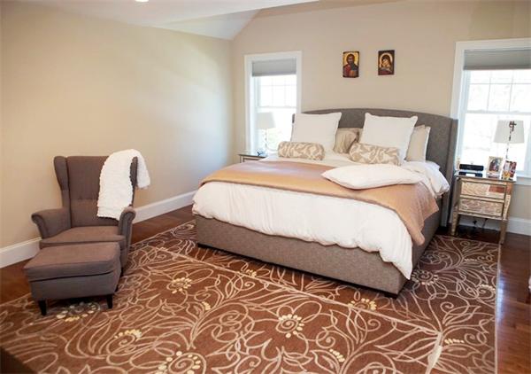 39 Thurston Lane Needham, MA 02492 - Photo 25 of 30 a bedroom with a bed a couch and a window