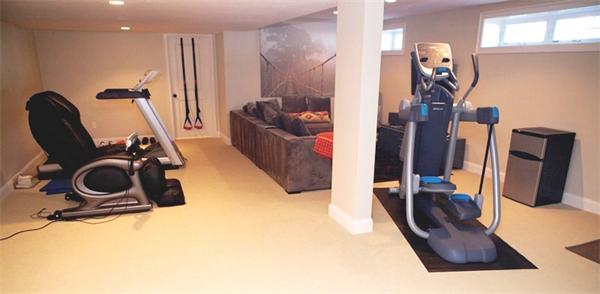 39 Thurston Lane Needham, MA 02492 - Photo 29 of 30 a room with furniture and gym equipment