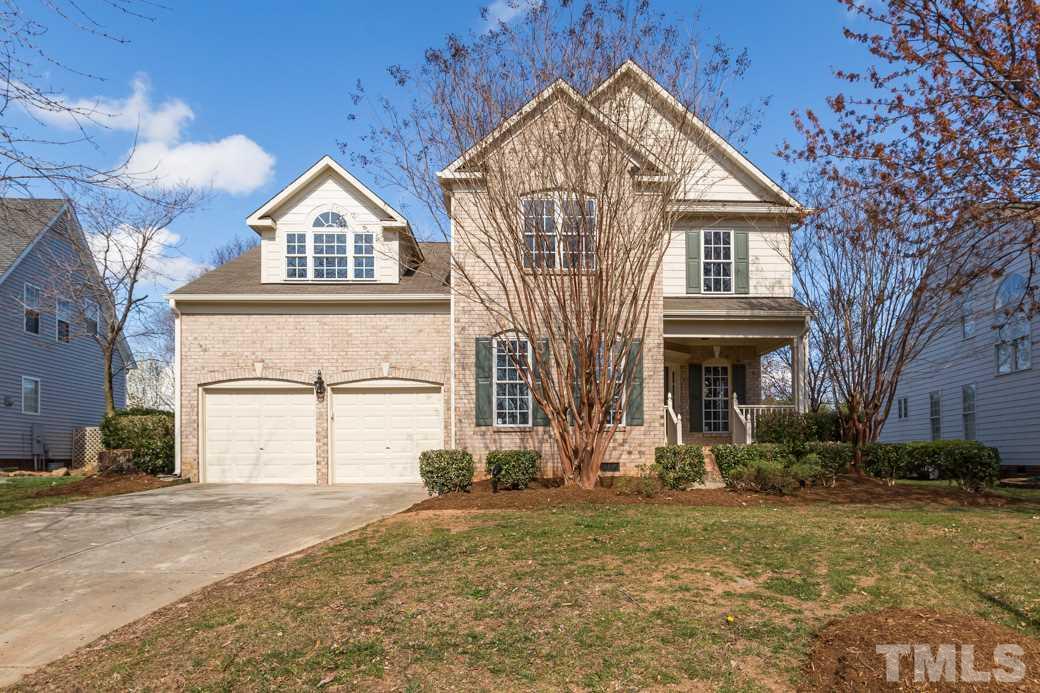 232 Seastone Street Raleigh, NC 27603 - Photo 1 of 20 a front view of a house with a yard