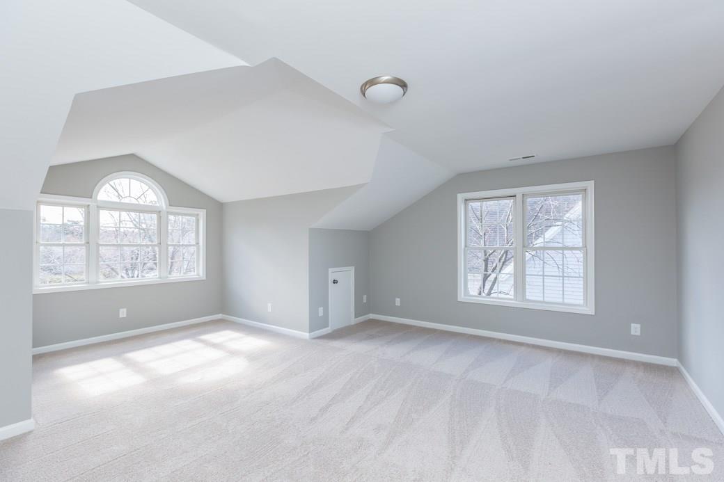 232 Seastone Street Raleigh, NC 27603 - Photo 17 of 20 a view of an empty room with a window