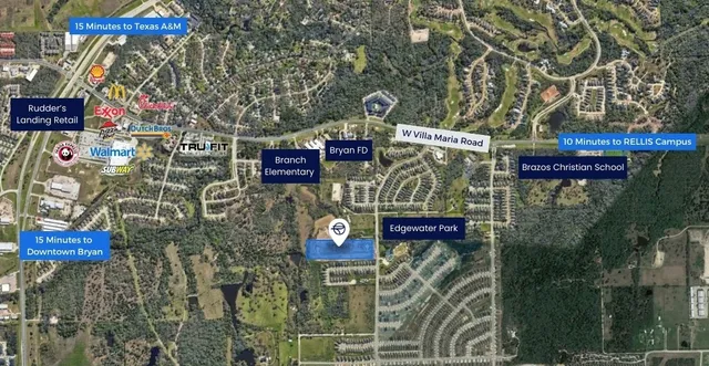 a sign board with buildings in the background