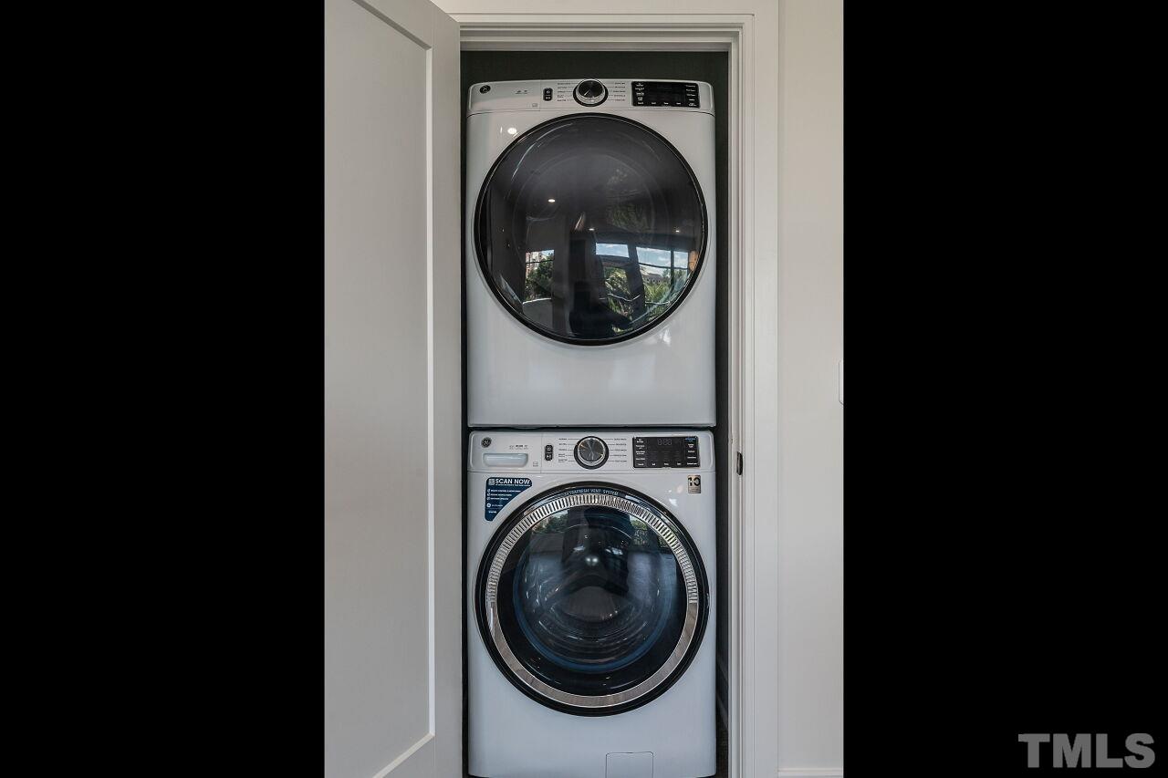 615 Daniels Street, Unit 318 Raleigh, NC 27605 - Photo 19 of 26 a close up view of a washer and dryer in a utility room