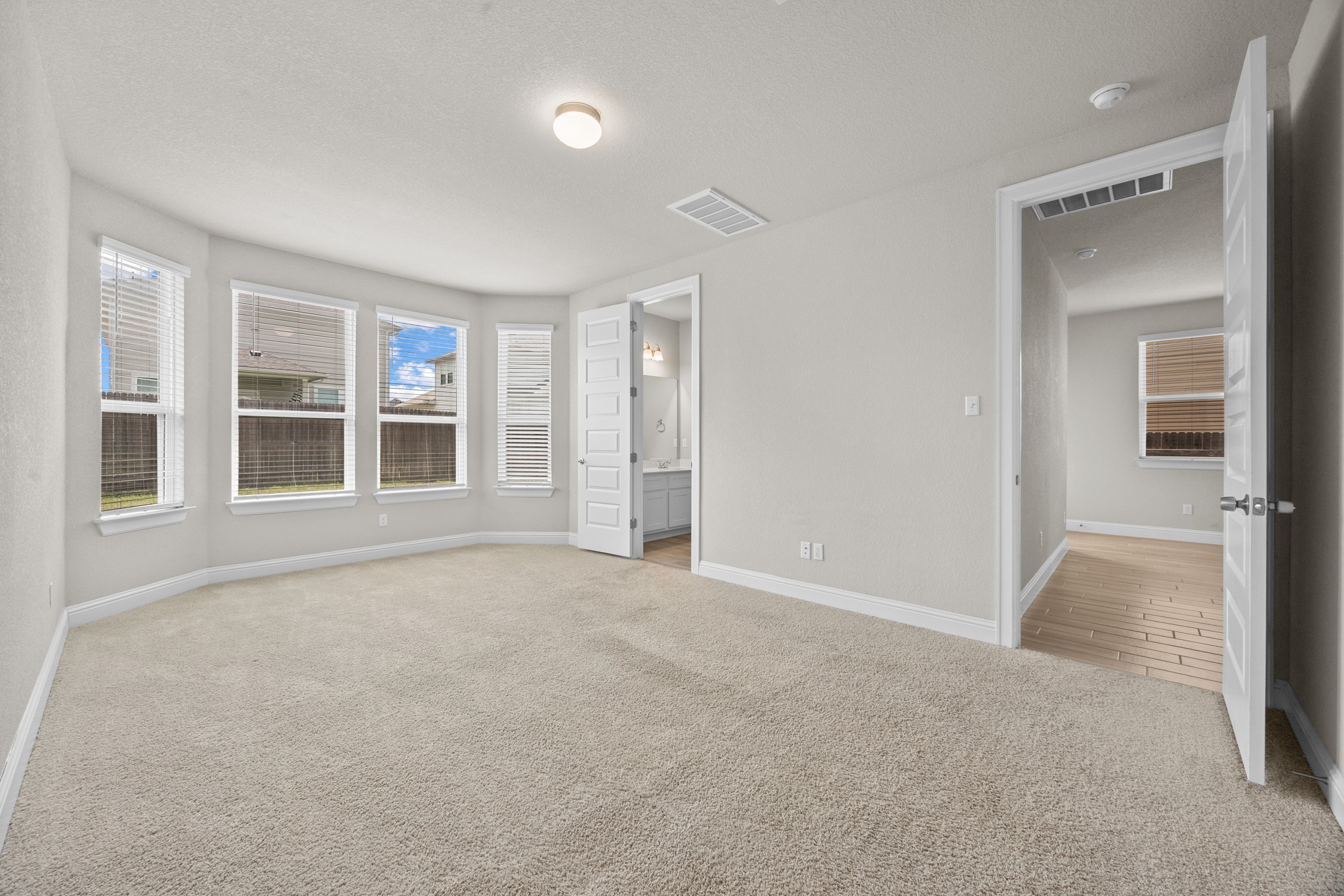 213 Graver Street Georgetown, TX 78626 - Photo 12 of 33 Primary Bedroom