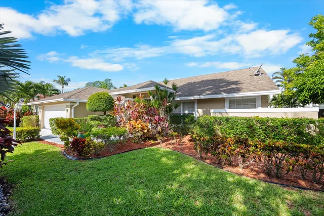a view of a house with a garden